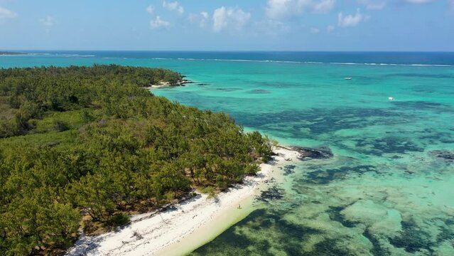 Ile aux Cerfs island with idyllic beach scene, aquamarine sea and soft sand, Ile aux Cerfs, Mauritius, Indian Ocean, Africa. Ile aux Cerf in Mauritius, beautiful water and breathtaking landscape.