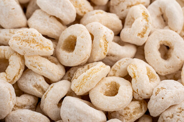 sweet corn rings. Tasty sweet cereal rings isolated on white heap of cereal cheerios on white background, delicious and useful rings breakfast cereal. breakfast cereal sweet rings isolated on white