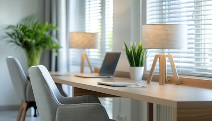 Modern home office with two desks, laptops, and plants.