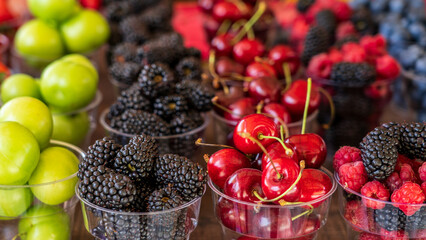 various fruits and berries sold by street vendors throughout Georgia.