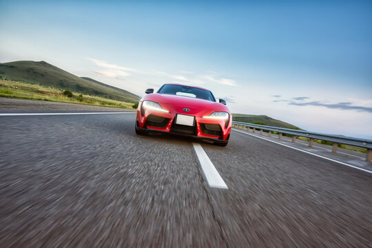Seattle, Washington, USA, July 02, 2024, Red Toyota Supra 2020. car on the highway road. Sports car concept