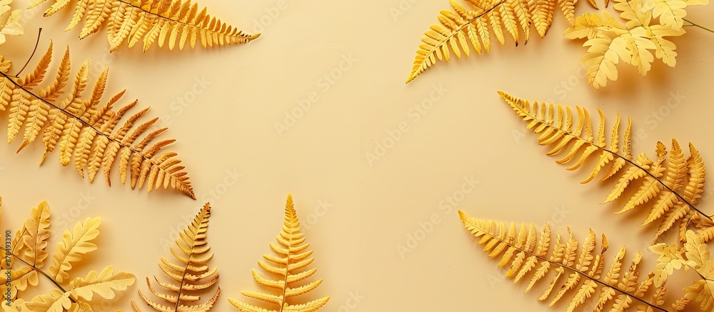 Poster beige background adorned with top-view yellow autumn fern leaves, creating a flatlay composition wit