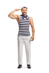 Fototapeta premium Full length portrait of a sailor saluting