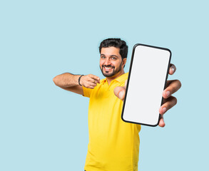 Indian asian Bearded Man Holding Smartphone Empty Screen, 3D Effect Hand Close-Up, Blue Background