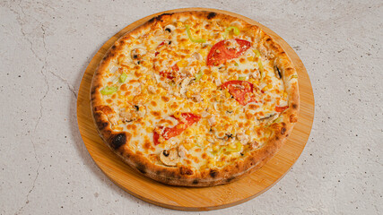 Delicious pizza isolated on wooden board