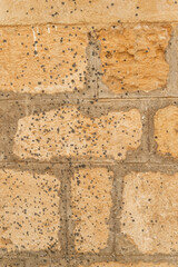 imagen detalle textura pared de piedra con juntas de cemento con salpicaduras de cemento