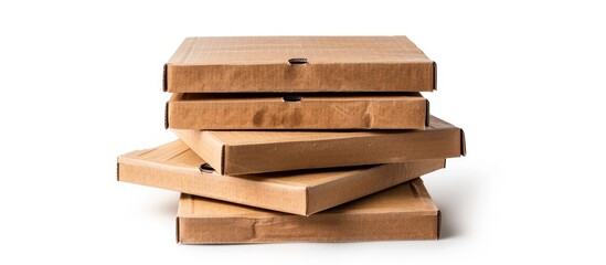 Front view of a stack of brown pizza boxes against a white backdrop, with a clipping path for a copy space image.