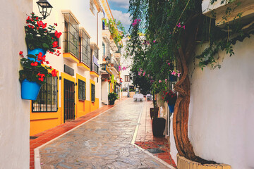 View of the historic district of Marbella and beautiful building facade, Spain