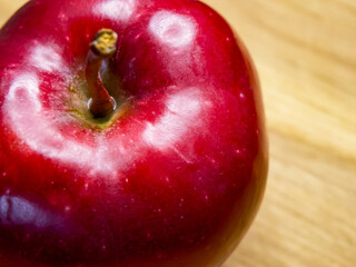 Bright Apple Image. Focus on a fresh, wet red apple, health concept.