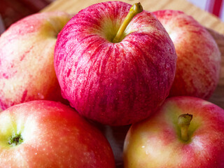 Crisp Apple Array: A selection of ripe apples, red and green, with natural textures. Uses: Healthy eating guides, food blogs.