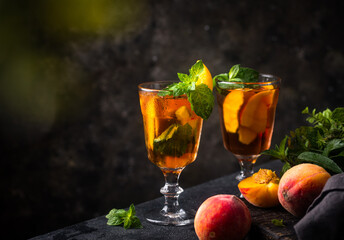 Cold ice tea with peach and mint