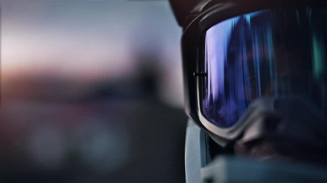 Rider with helmet and goggles on looking towards the camera, preparing for action, downhill mountain biker, enduro rider, atv, quad or motocross suitable equipment