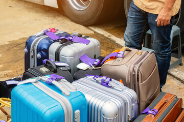 Many bag and luggage for loading into under vehicle or bus to prepare for trip in front of hotel....