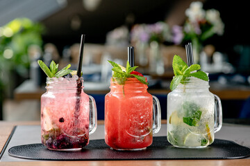 mojito cocktail on a wooden table