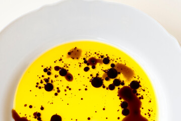 Olive oil with balsamic vinegar, texture. Basic Italian ingredients, natural eco style, close up