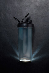 Spooky Illuminated Dark Sports Cup Glowing from Below for Halloween