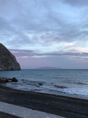 Sunset on the Perissa black sand beach, Santorini