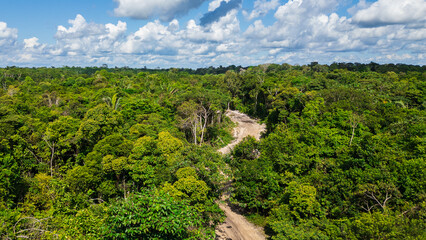 roads in the middle of the Amazon jungle, deforestation and sand extraction for construction is one of the main activities where large hectares of forest are deforested
