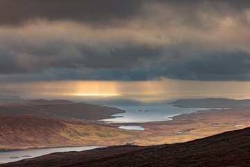 United Kingdom, Scotland, Shetland Islands, Mainland, Ronas Hill, growing storm and rays of...