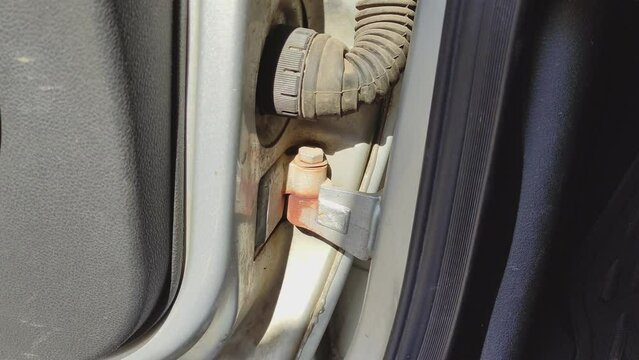 Rust on a car door hinge