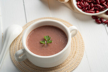 Healthy red bean soup in white bowl,quick and easy soup great source of nutrients and protein.