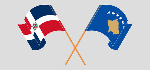 Crossed and waving flags of Dominican Republic and Kosovo