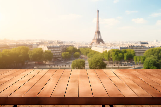 Empty wooden table in front of blurred Paris France background for product display in a coffee shop, local market or bar	