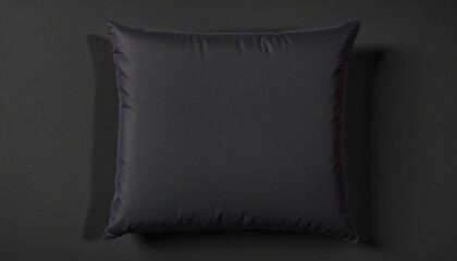 Modern Black Pillow with Detailed Cut-Out Design on Textured Fabric Background