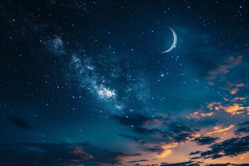 Fototapeta premium Bright crescent moon shining among a multitude of stars in the night sky, Bright crescent sweeping across the night sky