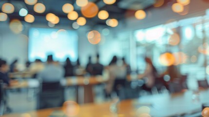 Blurred conference room presentation. Abstract out-of-focus shot of a conference room during a presentation, with light from ceiling lamps creating bokeh.