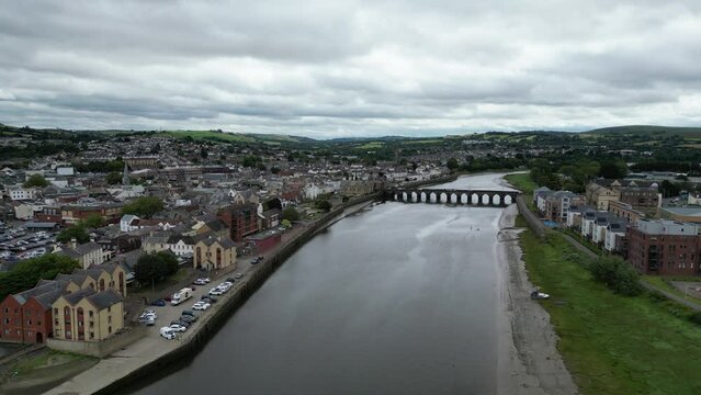 Barnstaple, Devon, England: DRONE VIEWS: Long Bridge spanning the River Taw in central Barnstaple. The medieval bridge reflects the town's early history as a prosperous wool trading centre (Clip 9).