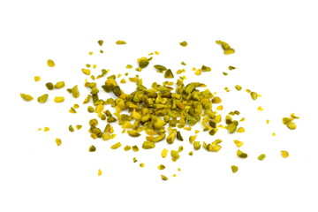 Ground, milled, crushed or granulated pistachio pile isolated on white background