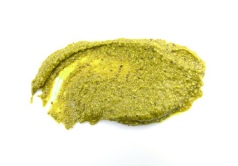 Creamy pistachio butter isolated on white background