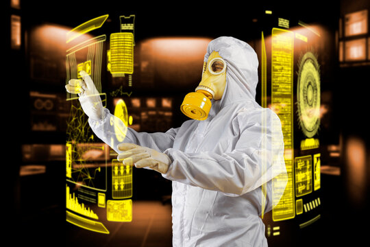 Man in a gas mask and protective suit analising nuclear data using AI with virtual visualization.