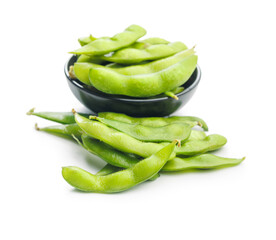 Green edamame pods. Fresh soybeans in bowl isolated on white background.