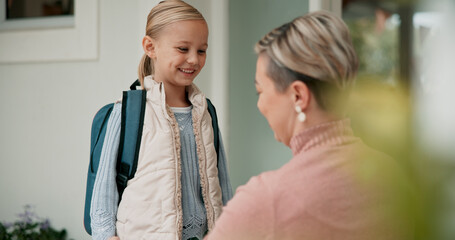 Mother, girl and school for goodbye with backpack, getting ready and smile for excited student. Class, mom and support or care from single parent person, woman and learning for education development