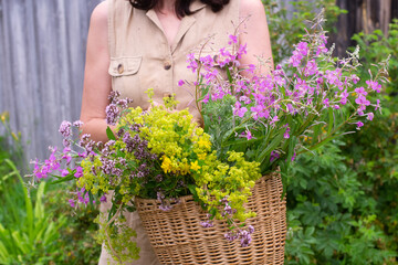 woman holding flowers