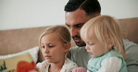 Father, children and reading book in bed for storytelling, literature and bonding at bedtime. Home, daddy and daughters learning together for love, language and support or fiction for fairytale