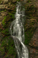 Obraz premium Hutsky waterfall in Krkonose mountains and national park in summer day