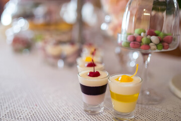 Dessert Shots on a White Tablecloth