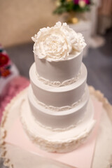 White Wedding Cake With Flower Decoration