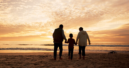 Fototapeta premium Family, love and holding hands at beach in summer for relax, travel and vacation as silhouette. People, children and back at ocean with solidarity for holiday, walking and love together by sunset