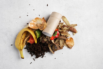 Organic food waste on white background . Vegetable peelings and food leftovers ready to compost....