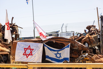Sa'ad, Israel – May 9 2024, Cars remaining, burned cars after the attack on October 7th by Hamas. The cars were collected on the farmer's field and serves now as an attacks memorial and a remainder.