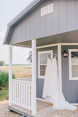wedding dress hanging on a bride hanger