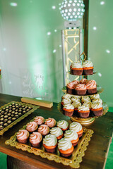 cake and desserts on wedding reception table