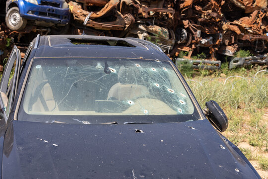 Sa'ad, Israel – May 9 2024, Cars remaining, burned cars after the attack on October 7th by Hamas. The cars were collected on the farmer's field and serves now as an attacks memorial and a remainder.