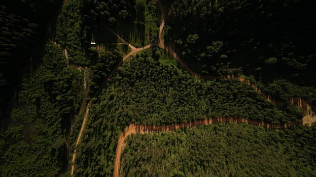 Top down aerial above RV camping in north Idaho mountains at sunset