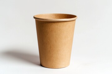 A simple brown paper cup placed on a table
