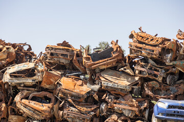 Sa'ad, Israel – May 9 2024, Cars remaining, burned cars after the attack on October 7th by Hamas. The cars were collected on the farmer's field and serves now as an attacks memorial and a remainder.